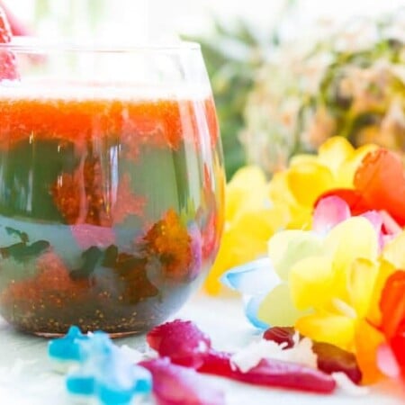 This easy mocktail recipe is inspired by Te Fiti in the movie Moana. With a little sweet strawberry puree mixed with tropical juices, it's the best mocktail for all ages!