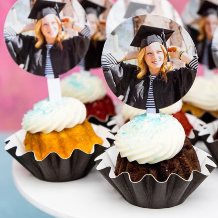 Picture perfect graduation party decorations to celebrate your graduate in the best way! Love how they incorporated photos into the graduation party food, graduation party games, and more!