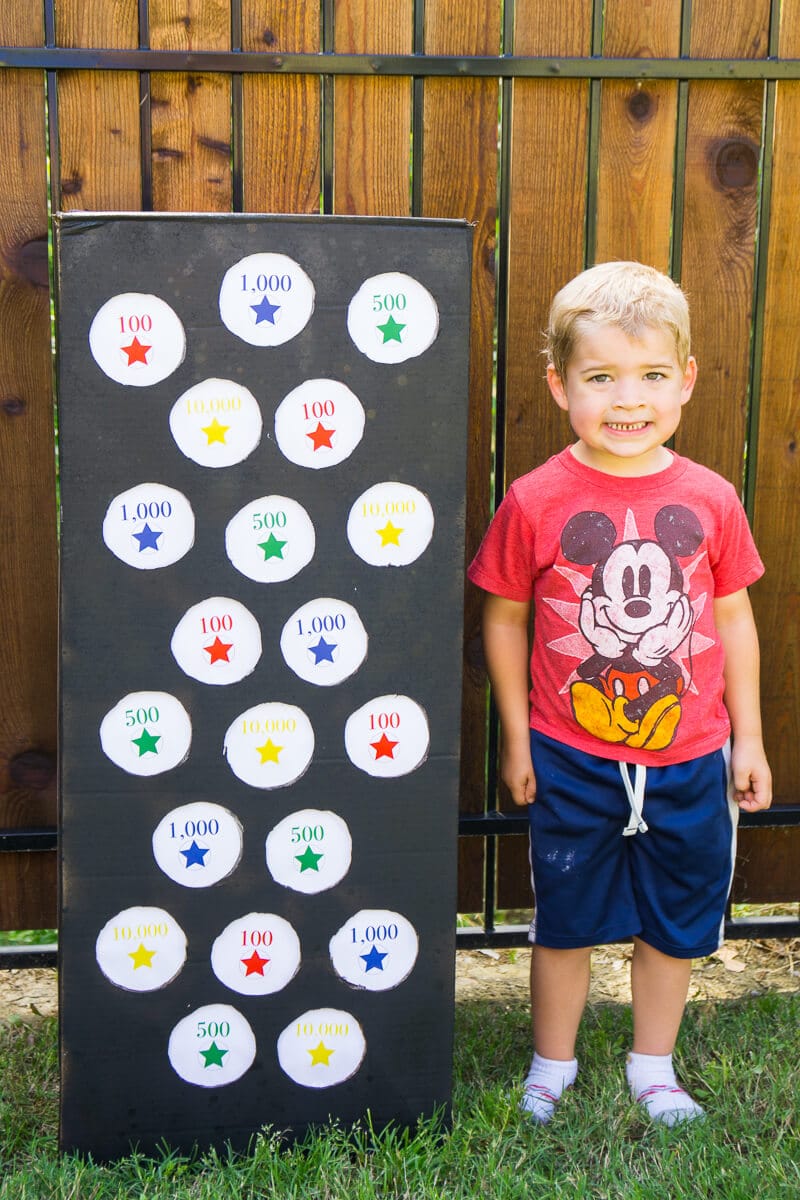 Make your own Toy Story Midway Mania games at home with this fun outdoor games tutorial! With everything from a homemade balloon darts to a punch box, so many fun ideas!