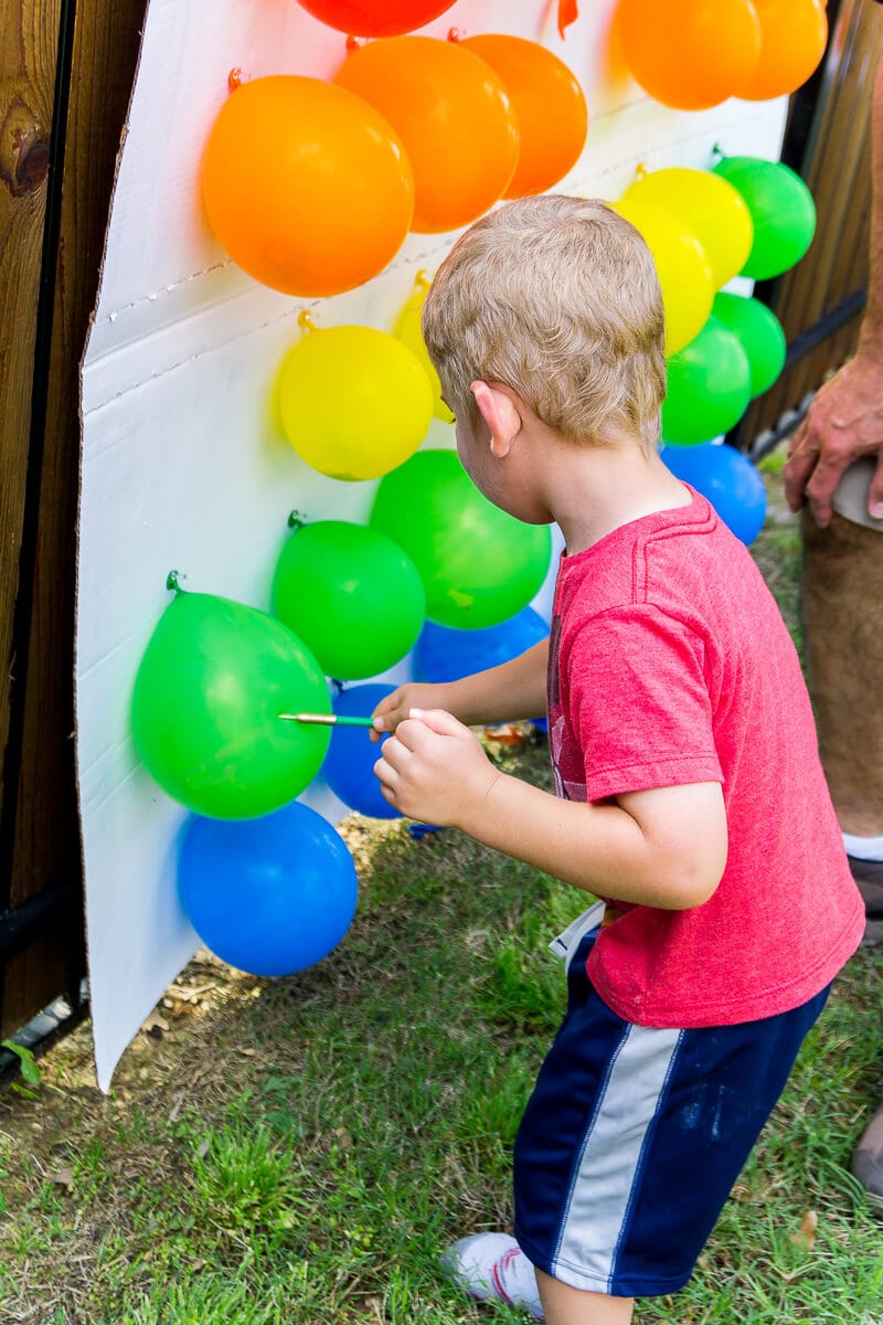 Make your own Toy Story Midway Mania games at home with this fun outdoor games tutorial! With everything from a homemade balloon darts to a punch box, so many fun ideas!