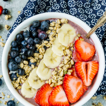 This red white and blue very berry smoothie bowl recipe is not only an easy and healthy breakfast option but also delicious! Add frozen strawberry, a little veggie protein powder, and your favorite berry for one great recipe!