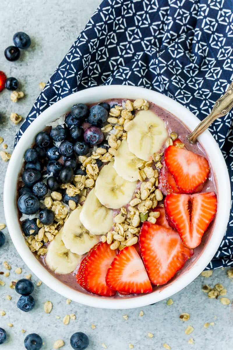 This red white and blue very berry smoothie bowl recipe is not only an easy and healthy breakfast option but also delicious! Add frozen strawberry, a little veggie protein powder, and your favorite berry for one great recipe!