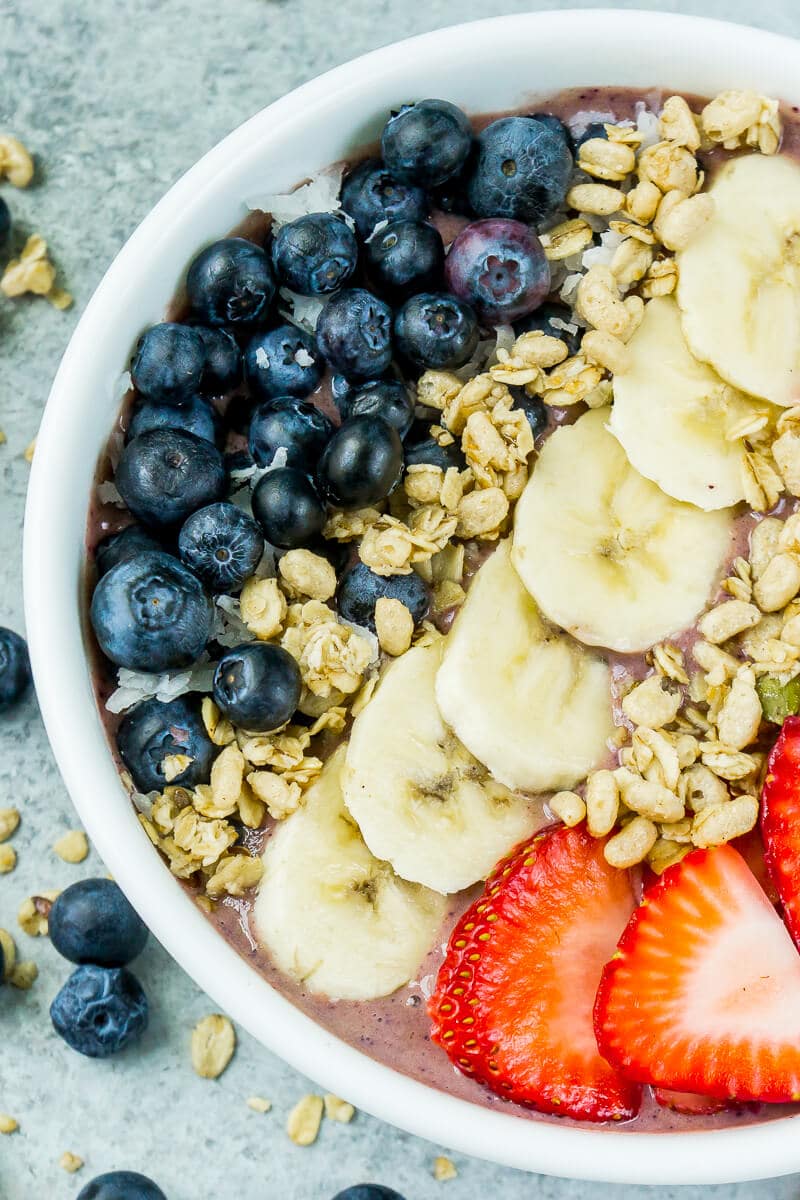 This red white and blue very berry smoothie bowl recipe is not only an easy and healthy breakfast option but also delicious! Add frozen strawberry, a little veggie protein powder, and your favorite berry for one great recipe! 