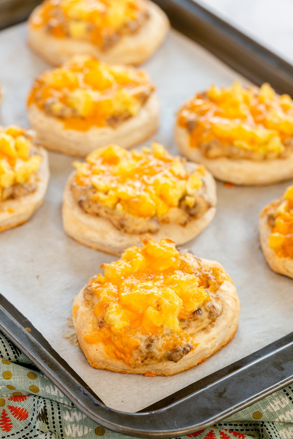 biscuits and gravy pizza on a cookie sheet