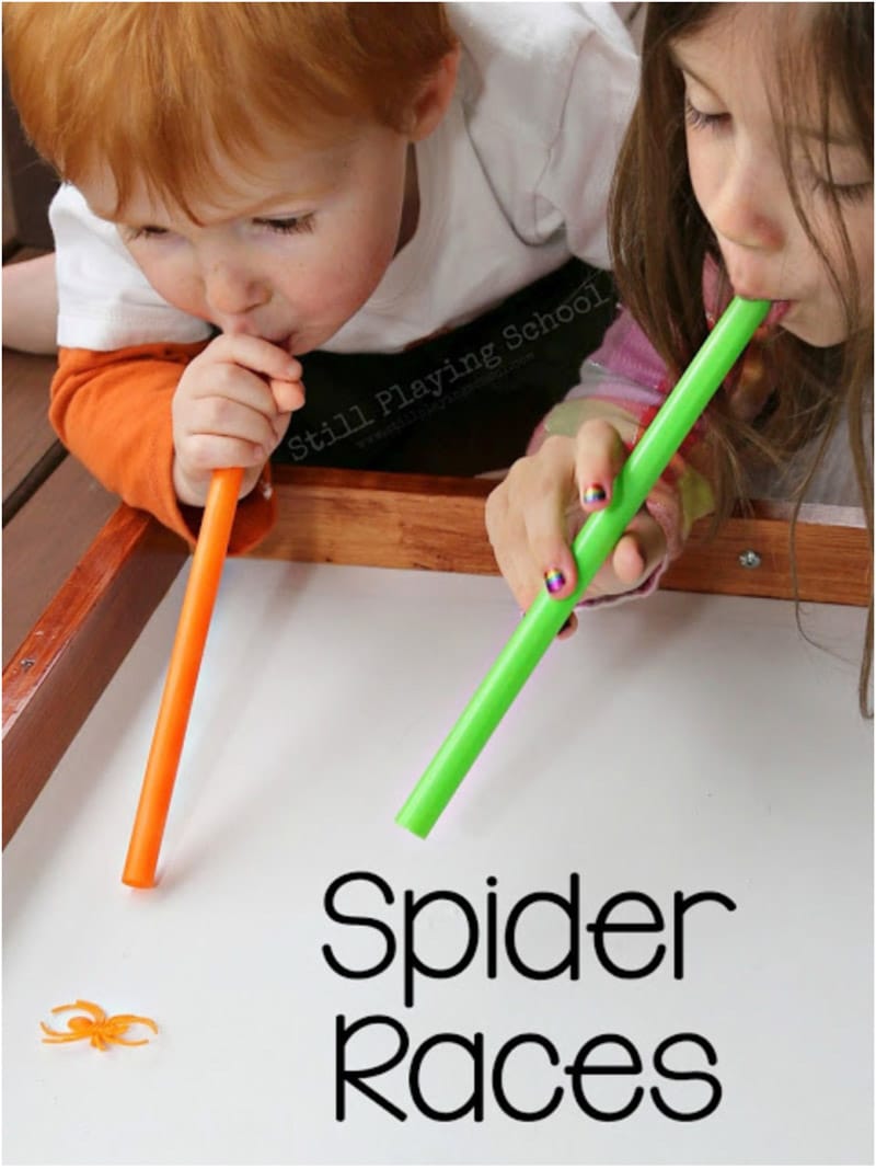 Kids doing spider races and other Halloween party games