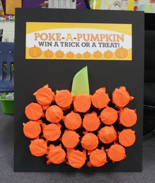 A poke a pumpkin board for the best Halloween party games