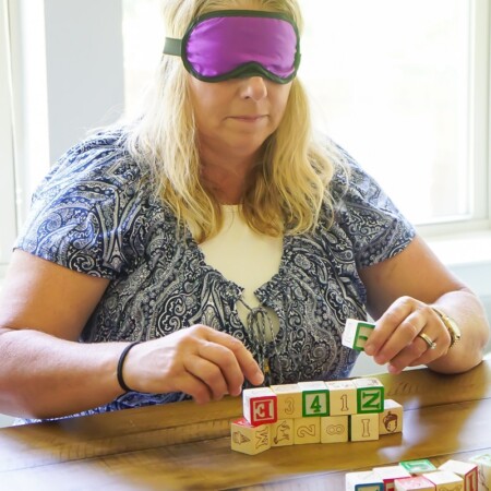 Blindfolded blocking is one of the best baby shower games