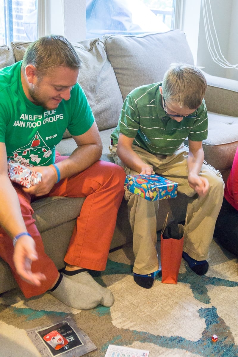 A family playing the switch steal unwrap gift exchange game