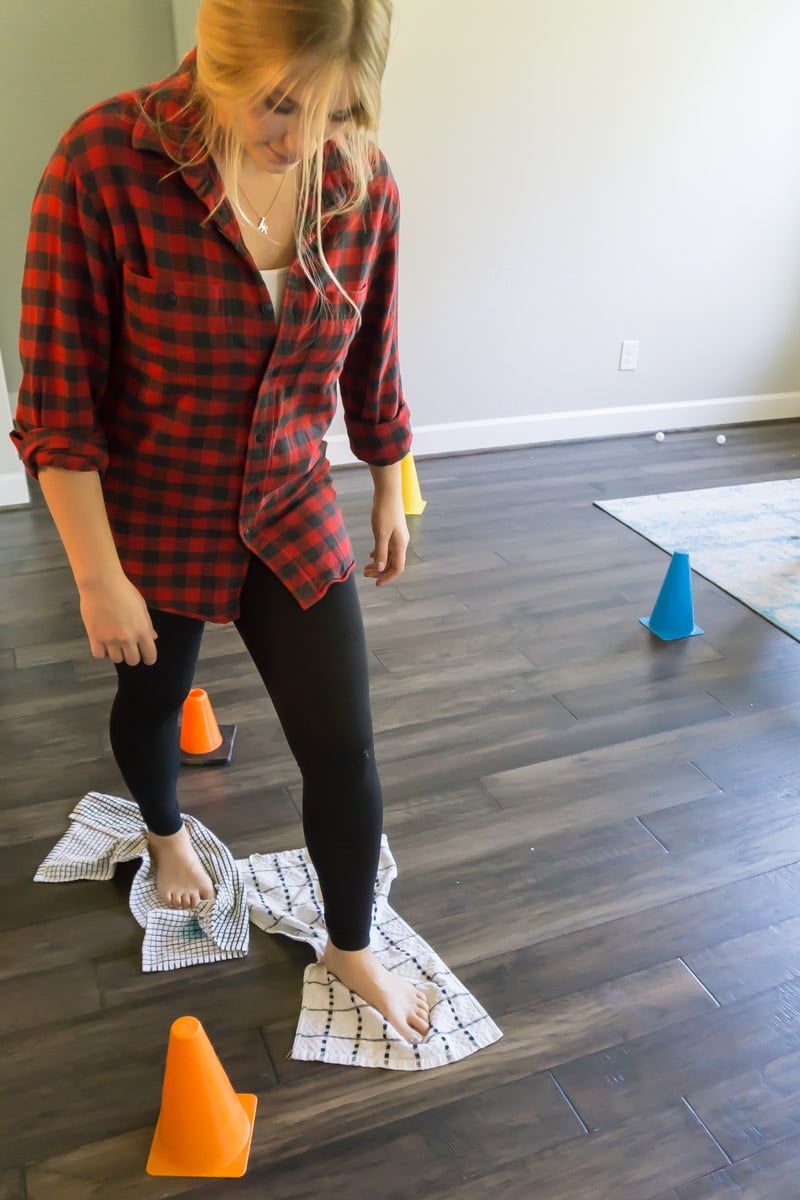 girl skating on rags around cones