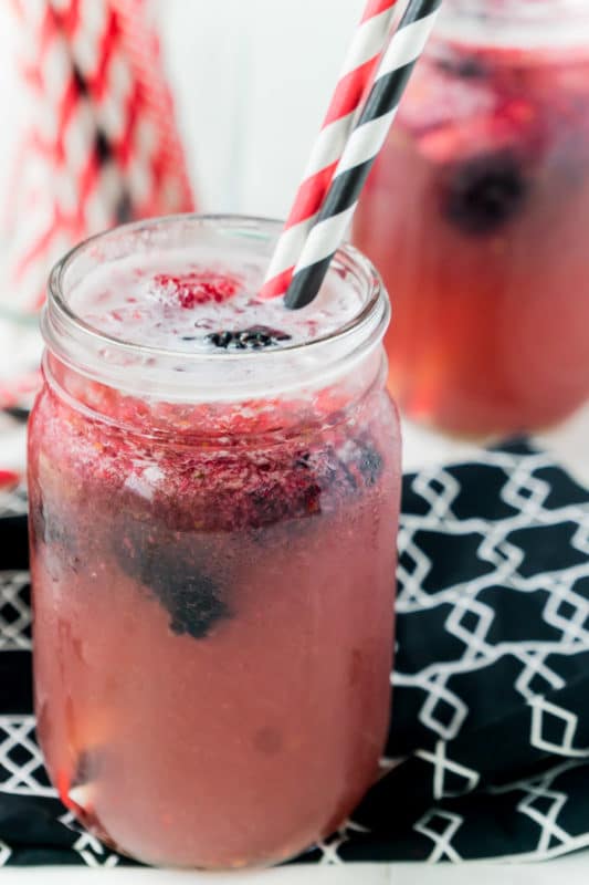 A triple berry mocktail made with simple syrup