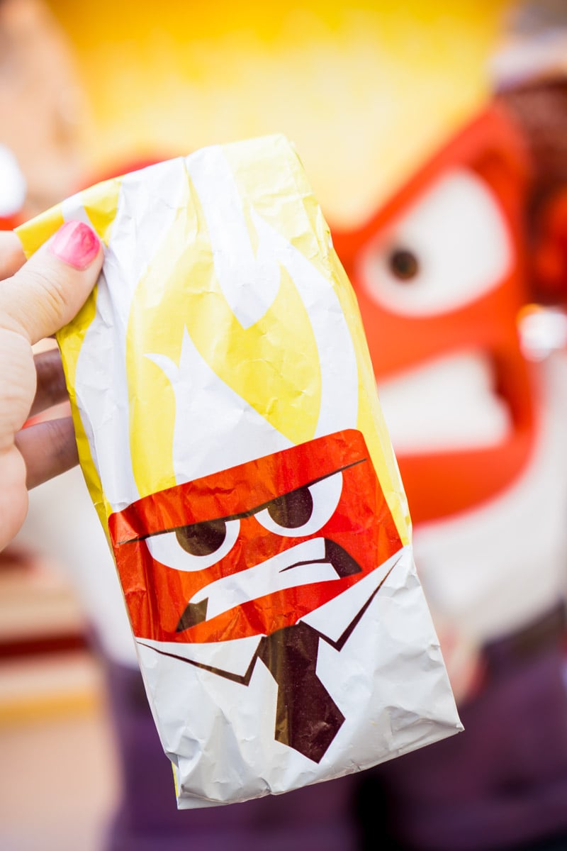 A cute inside out angry bag holding disneyland food