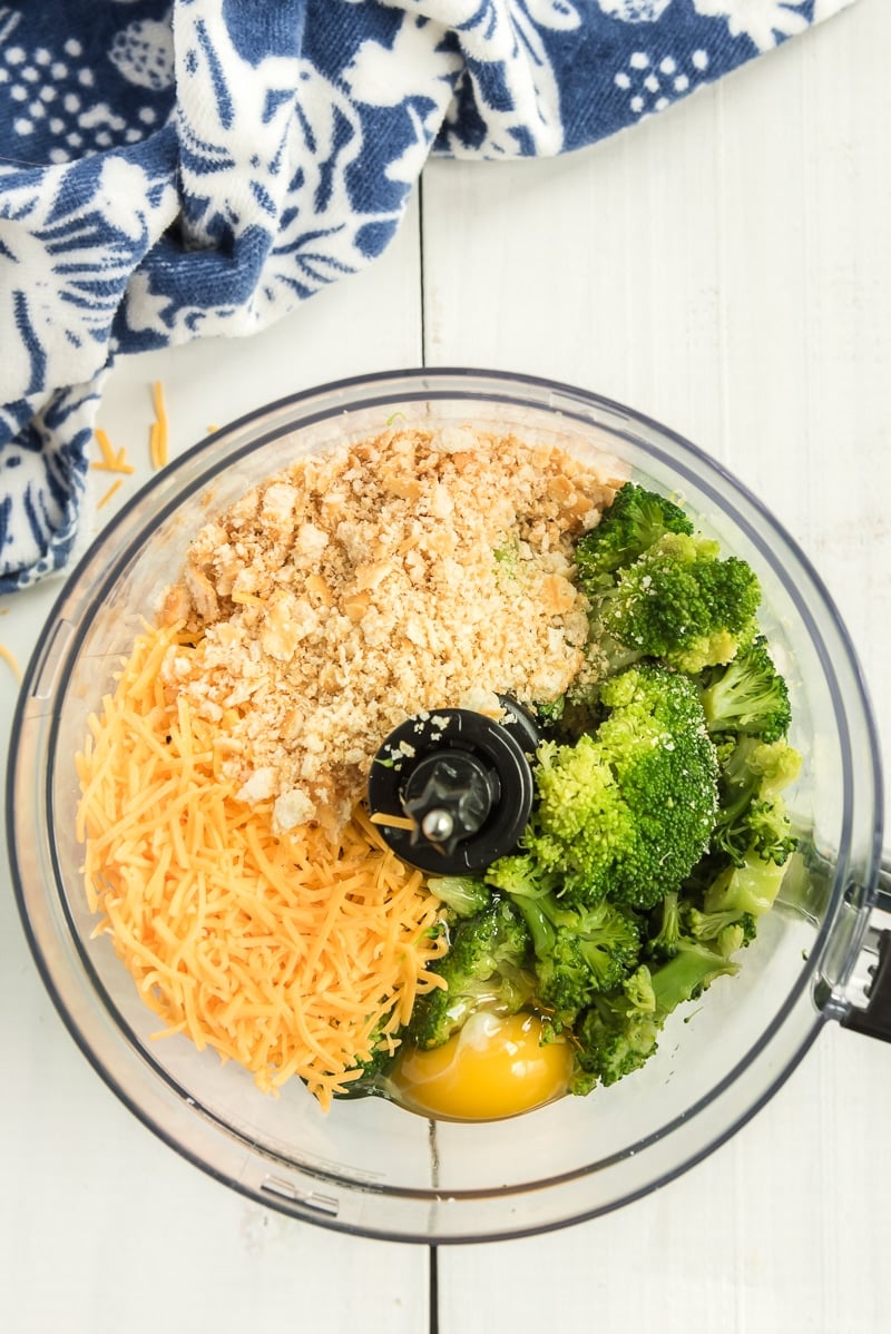 Ingredients for broccoli bites in a food processor