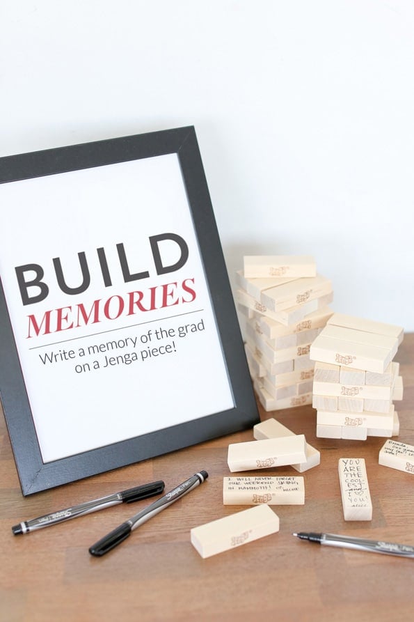 Jenga game with a build picture frame and pens