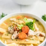 Close bowl of chicken noodle soup with egg noodles
