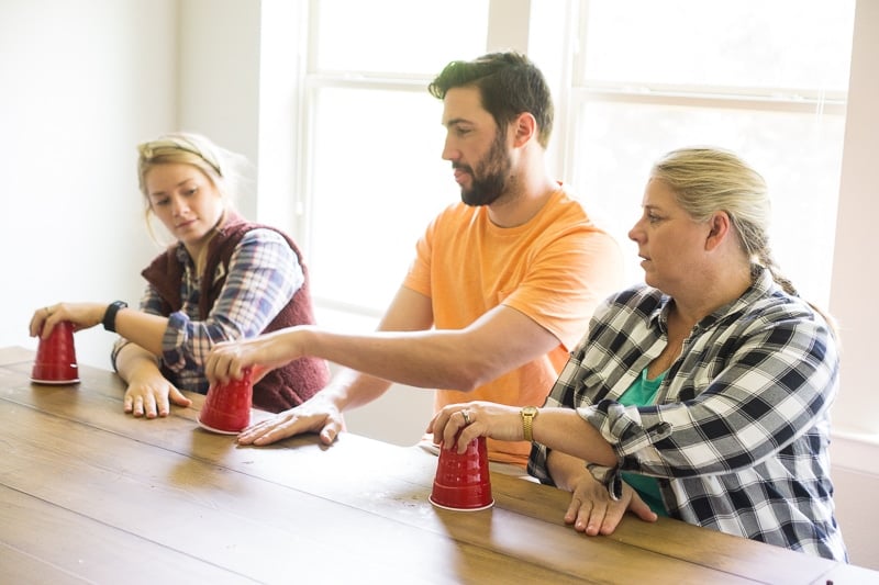 The cup game is one of the best camping games for adults or teens