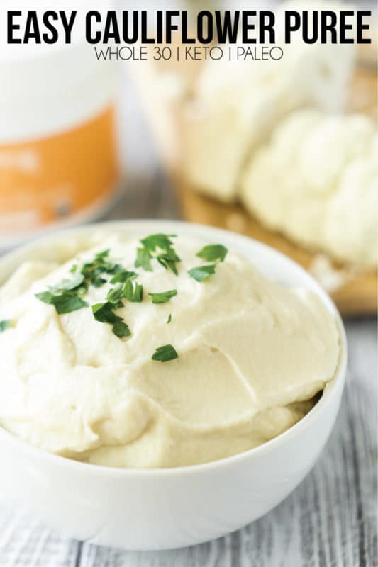 Smooth cauliflower puree sprinkled with fresh parsley