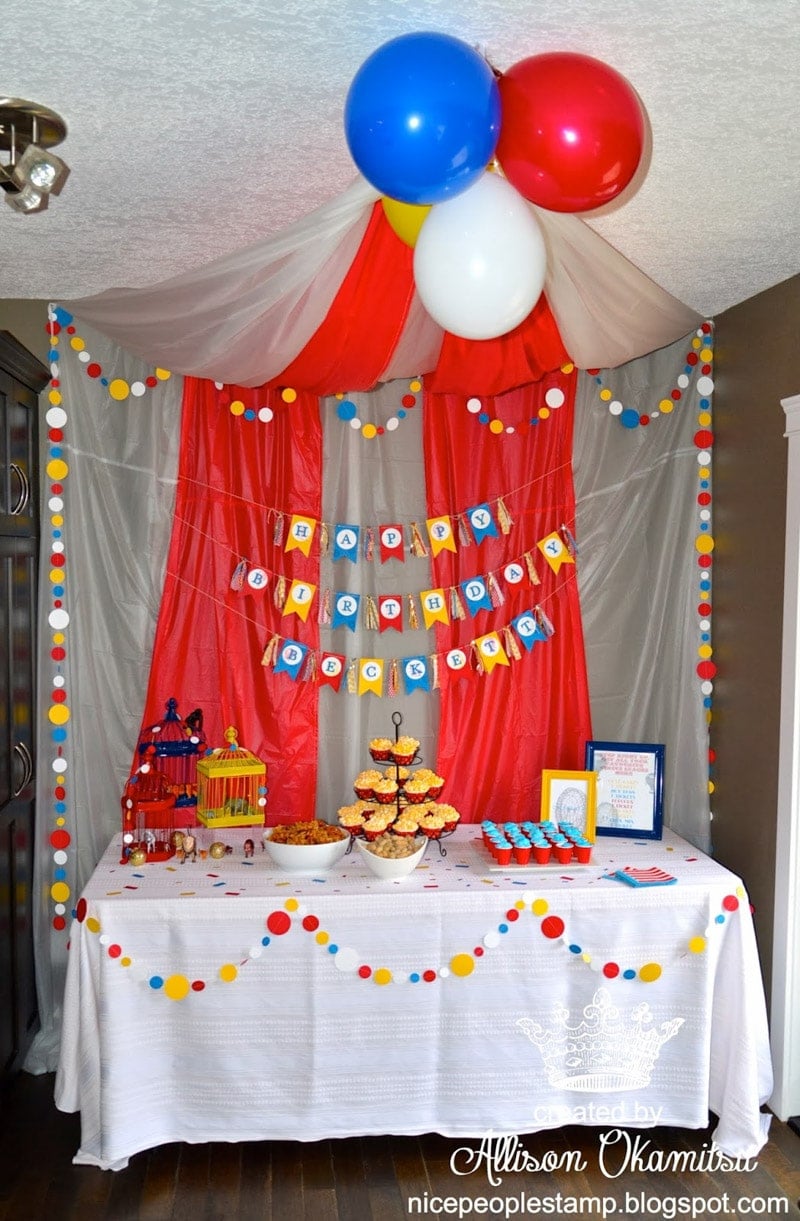 Circus party table with a DIY tablecloth tent