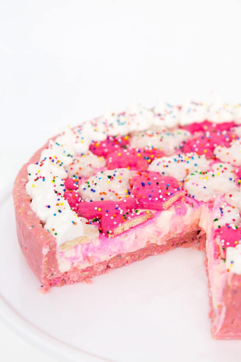Circus animal cheesecake at a pink and white circus party