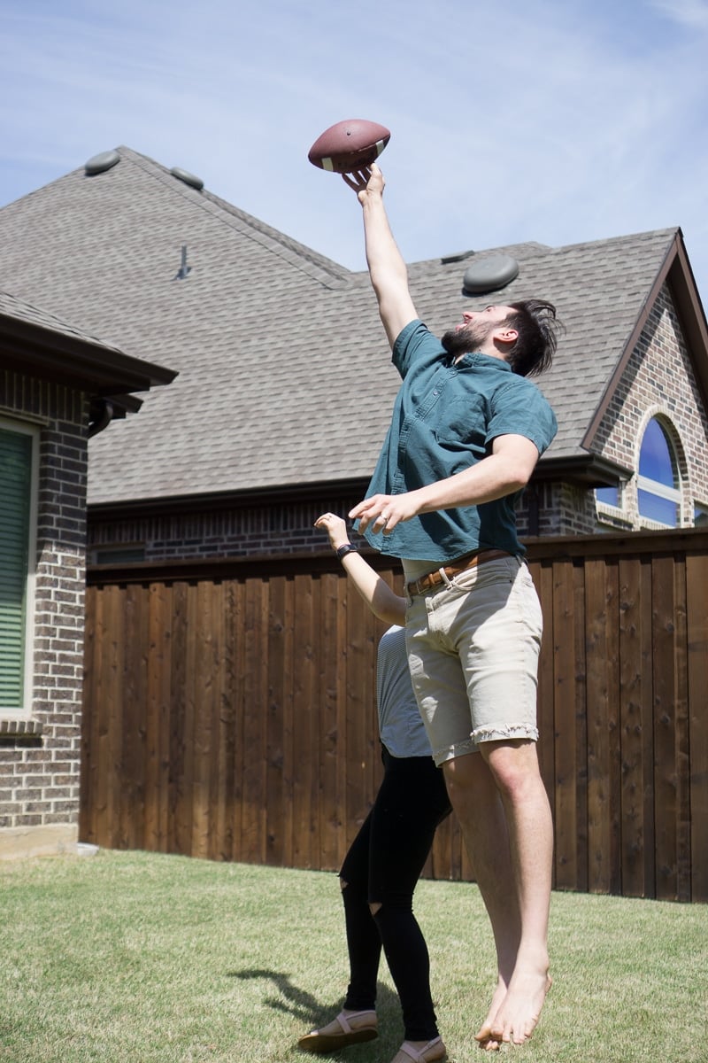 Jumping for a football in 500, one of the best outdoor games for adults