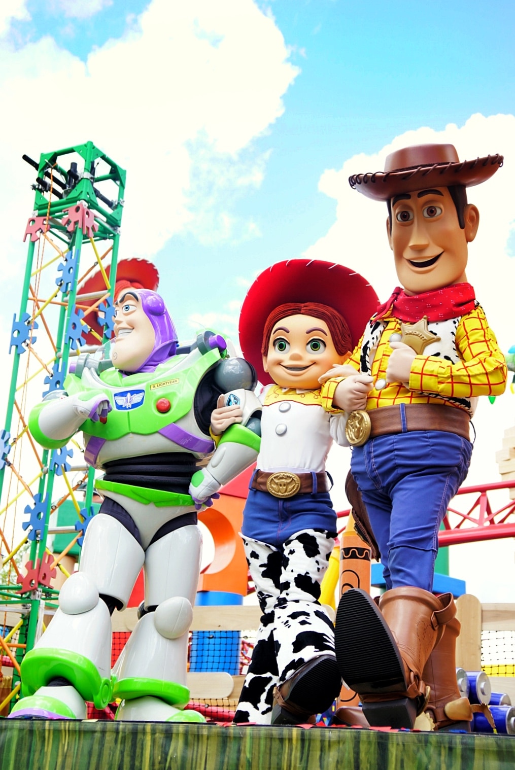 Toy Story characters posting at the Toy Story land dedication
