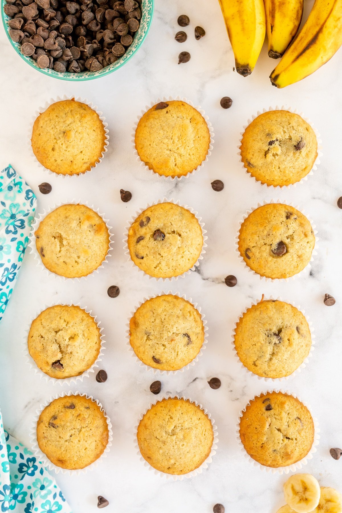 Banana chocolate chip muffins in a row