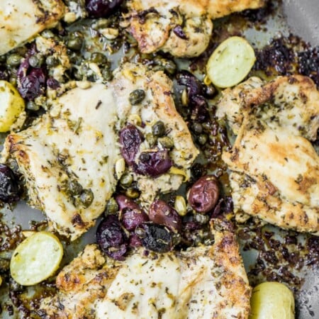 Lemon chicken thighs baked in a pan