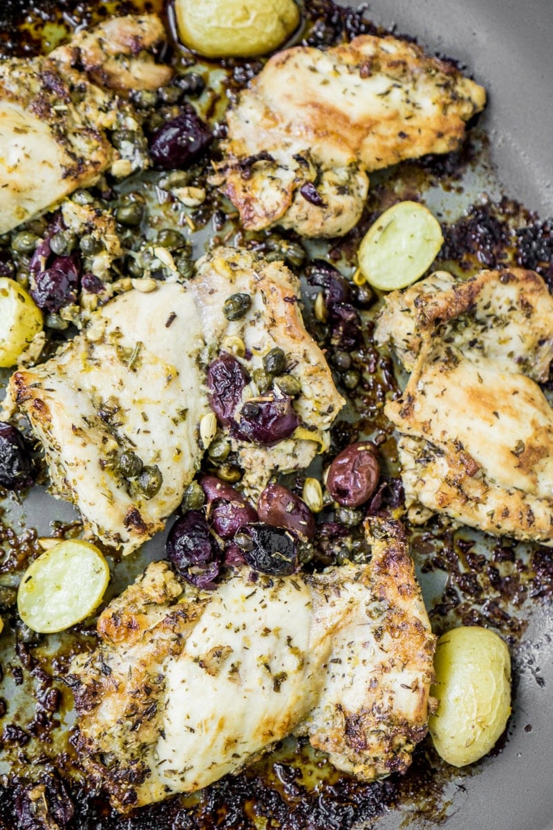 Lemon chicken thighs baked in a pan