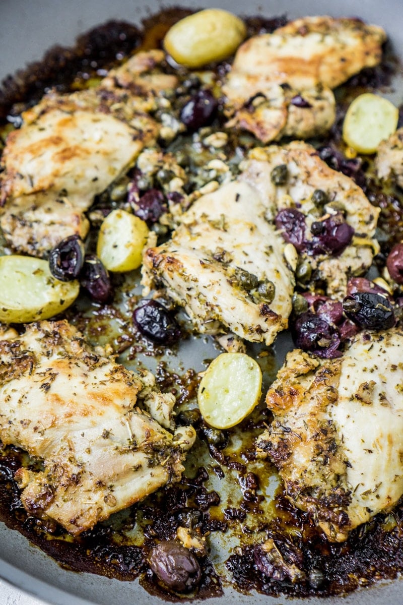 A pan of baked lemon chicken thighs cooked to perfection