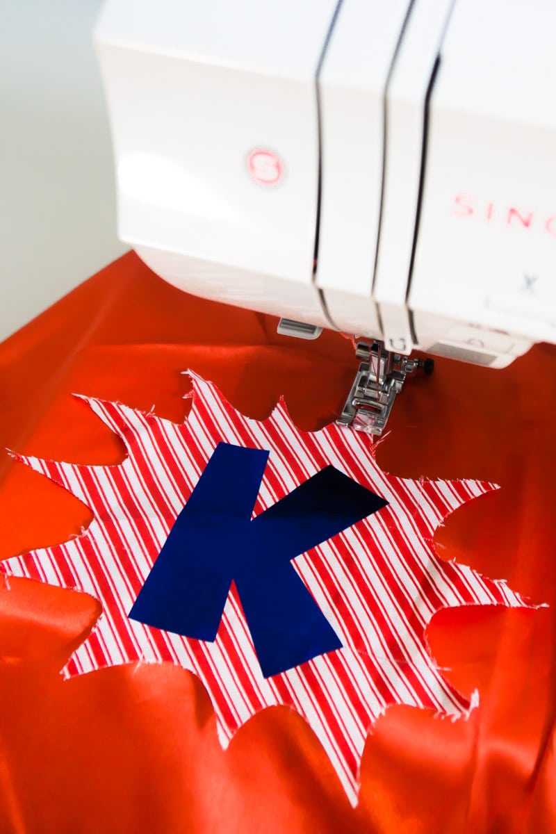 Sewing onto capes for a DIY superhero costume 
