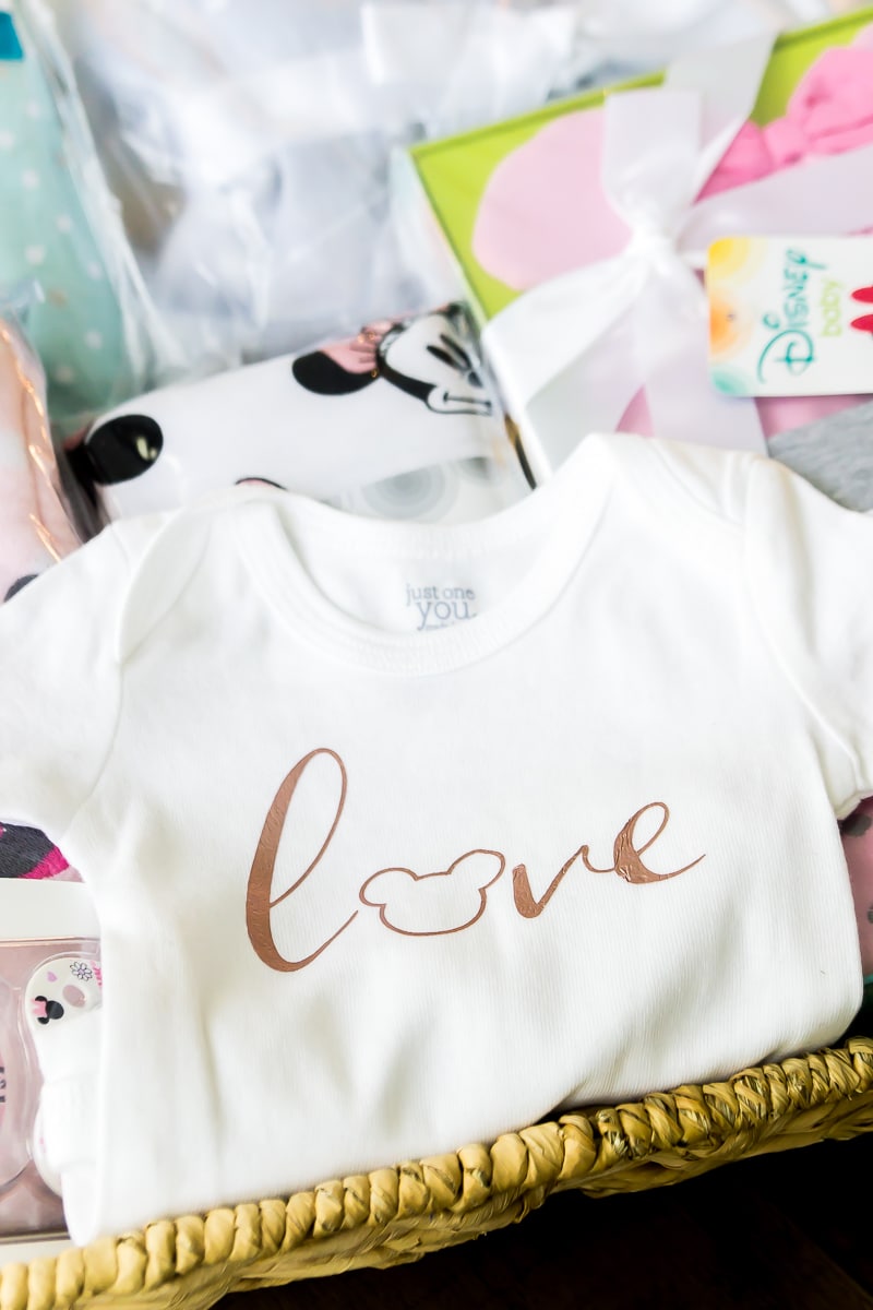 A DIY DIsney onesie and a baby shower gift basket