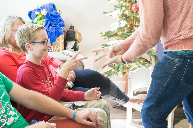 Playing rock paper scissors can be one of the most fun Christmas party games
