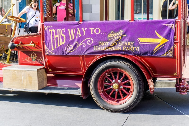 Truck with a sign pointing to the Mickey's Not So Scary Halloween Party