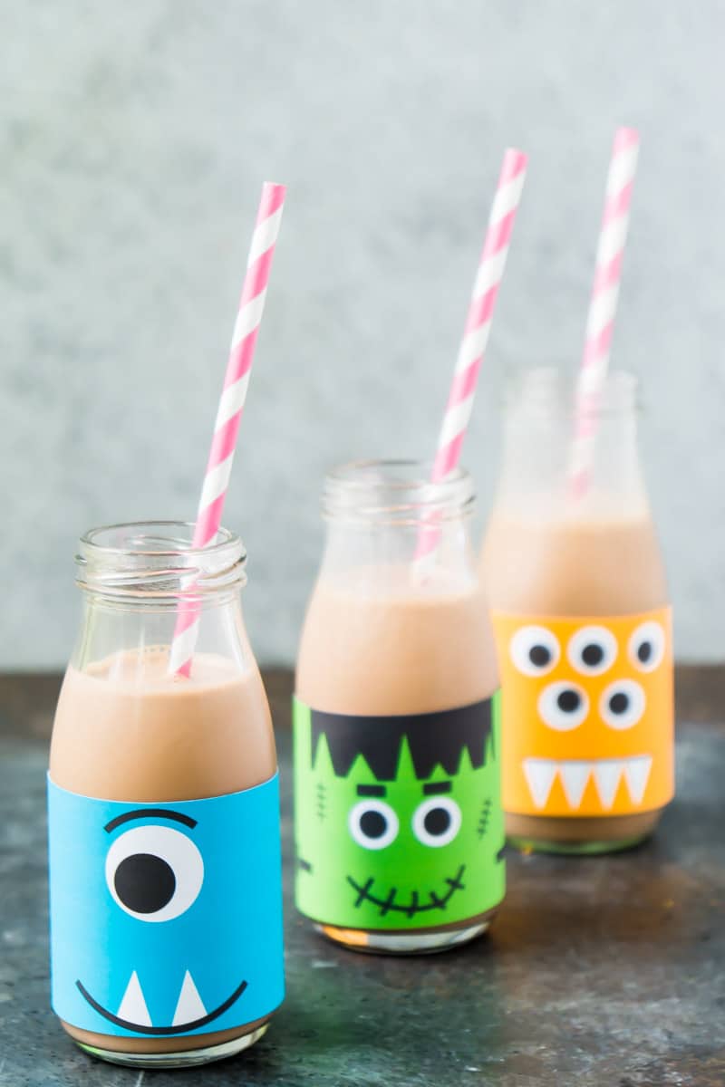 Milk bottles decorated as milk for a Halloween party