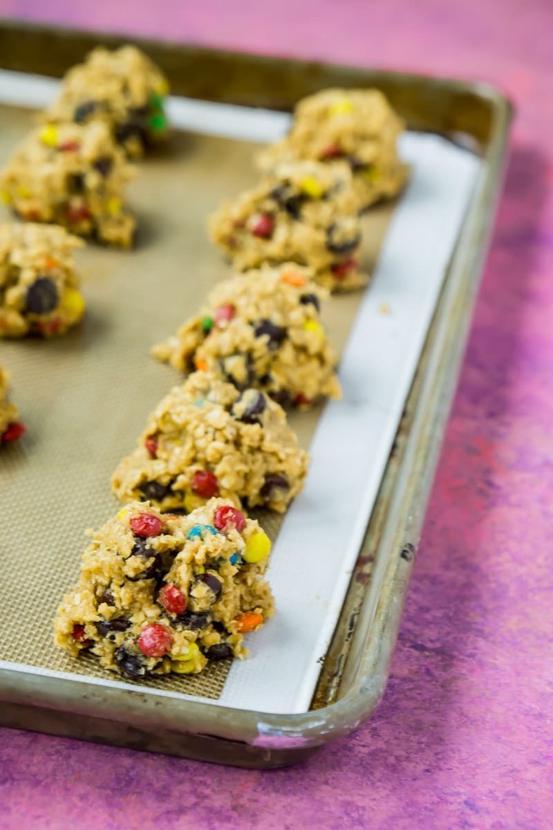 Monster cookie dough in a close-up shot on a cookie sheet