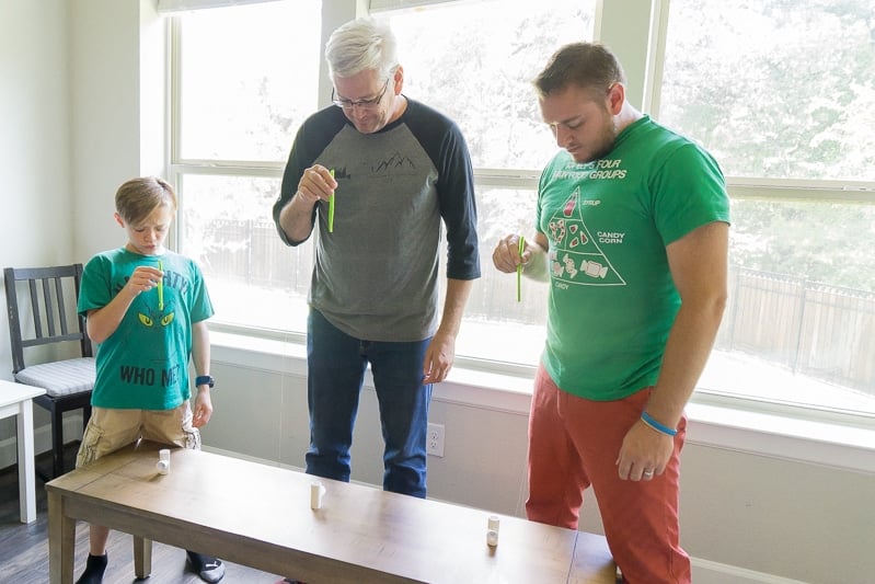 Dropping pipe cleaners in one of the most hilarious Christmas games