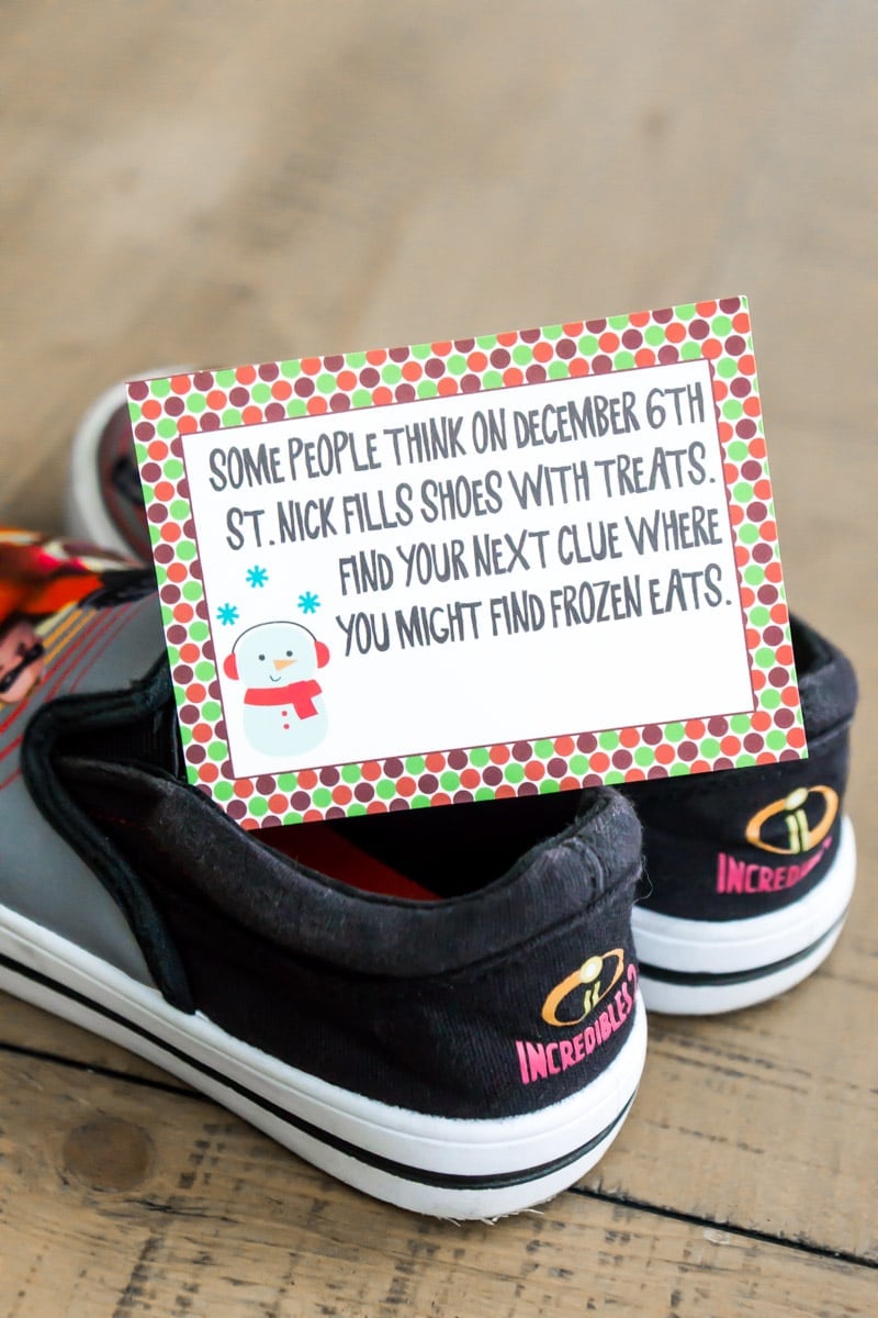 Christmas scavenger hunt clues on a pair of shoes