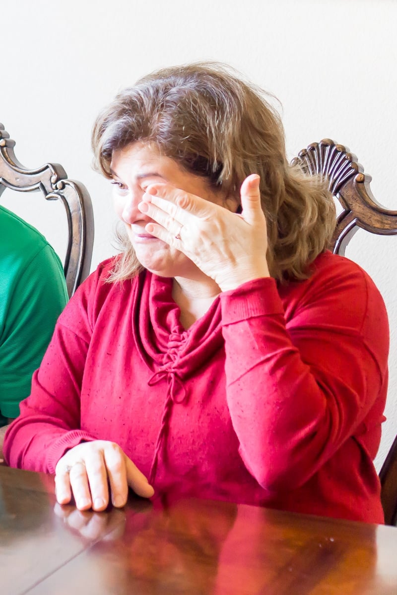 Grandma crying after opening her grandparents gifts