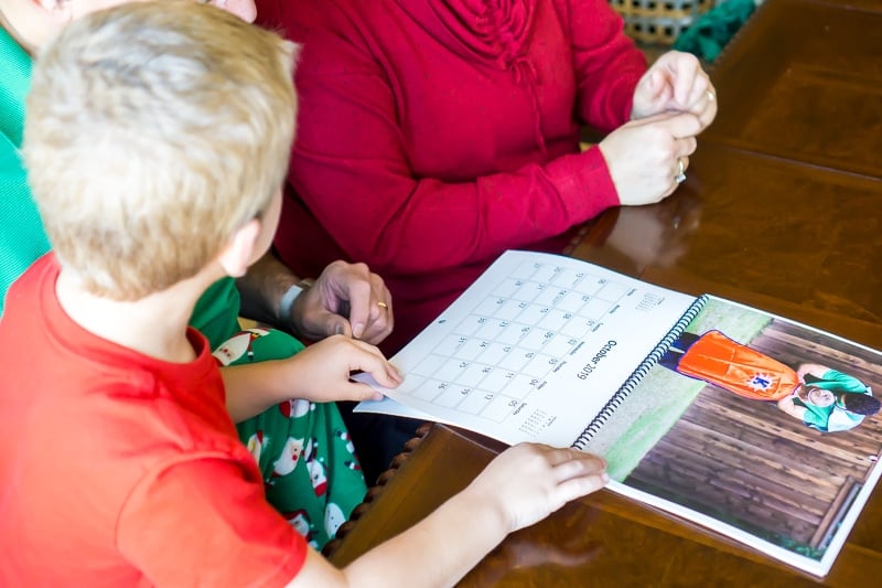 Grandparents enjoying the best gifts for grandparents with their grandson