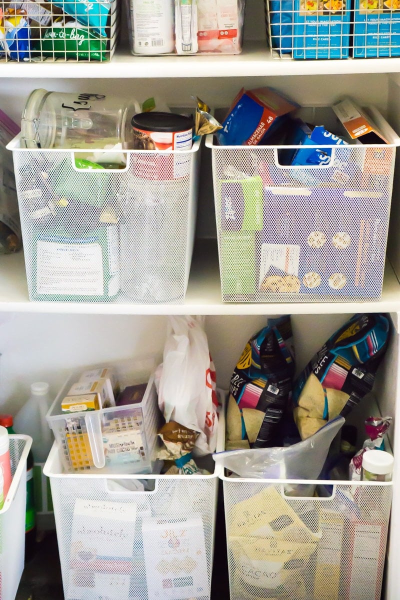 A pantry filled with cute buckets and other tips for showing your house