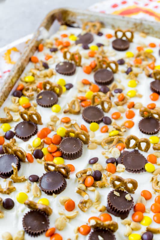 white chocolate bark with reese's peanut butter cups an pretzels