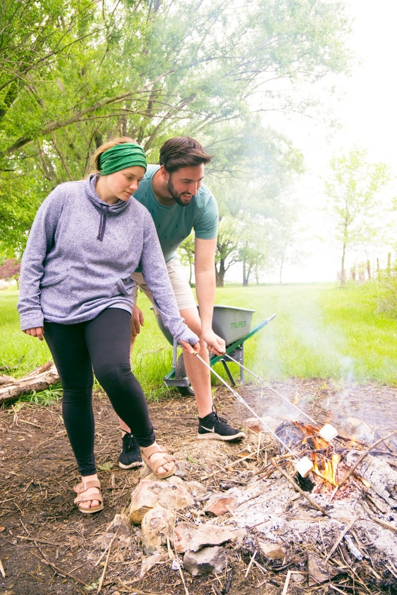 Cooking s'mores at a DIY s'mores bar