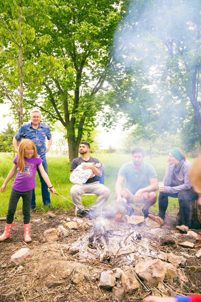 Family enjoying DIY s'mores bar ideas