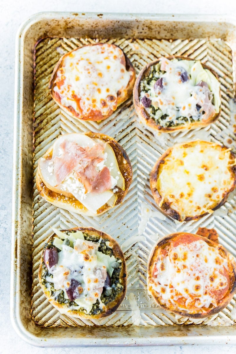 Cooked English muffin pizza on a pan