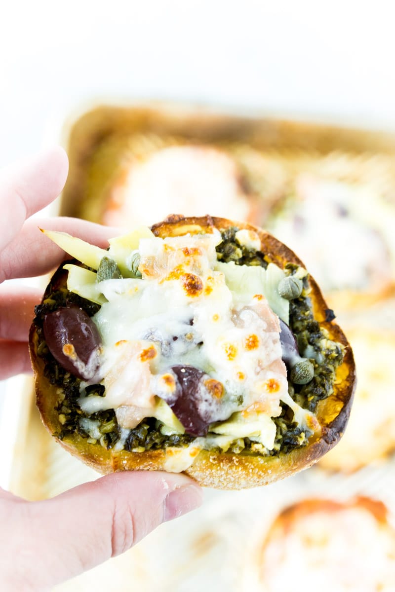 A healthy English muffin pizza with pesto