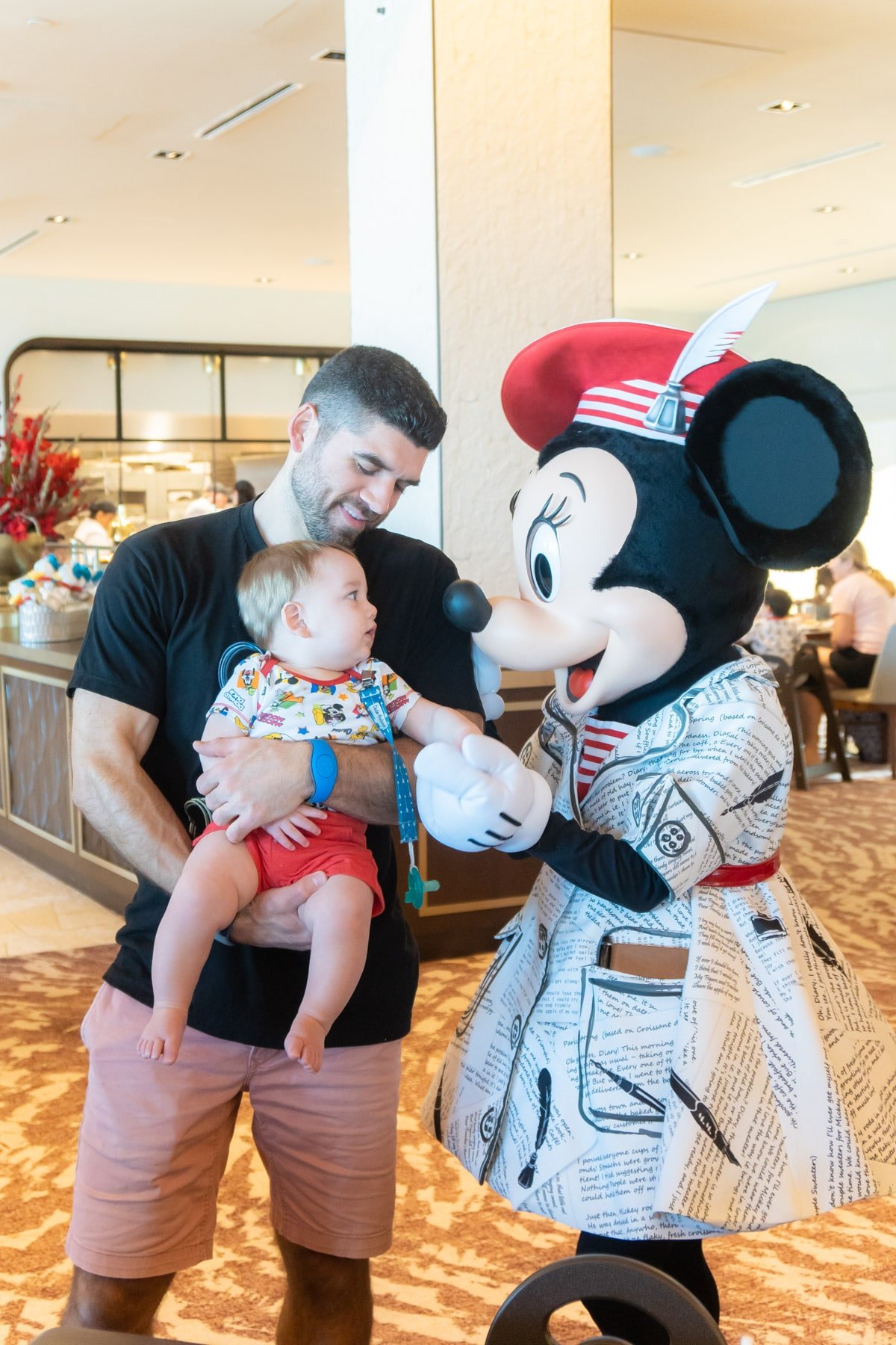 Man and baby with Minnie Mouse