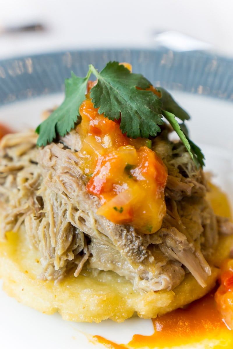 Pork topped arepas at one of the top Disney World restaurants