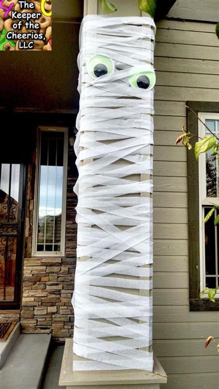 Mummy wrapped pole and other Halloween party ideas