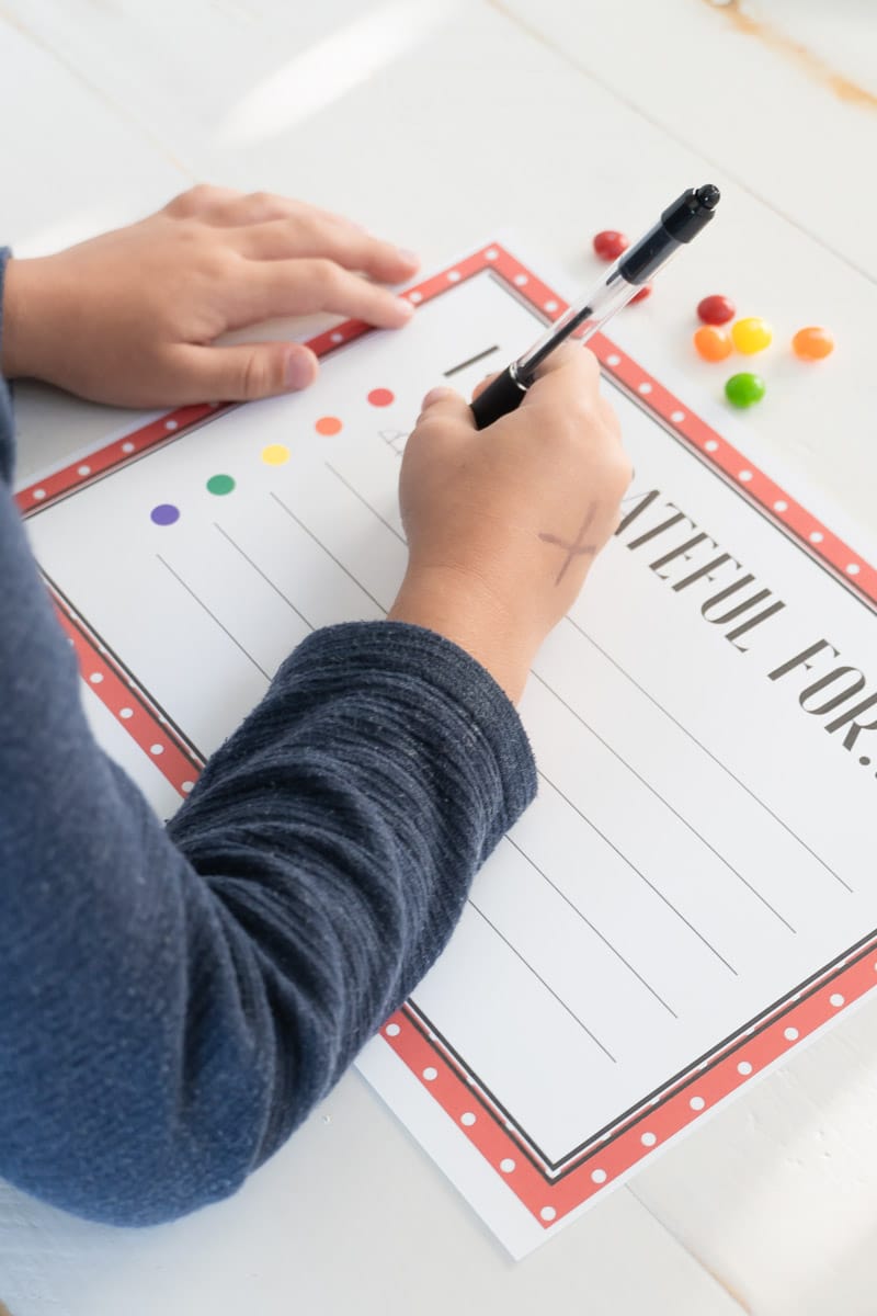 Writing during the gratitude skittles game