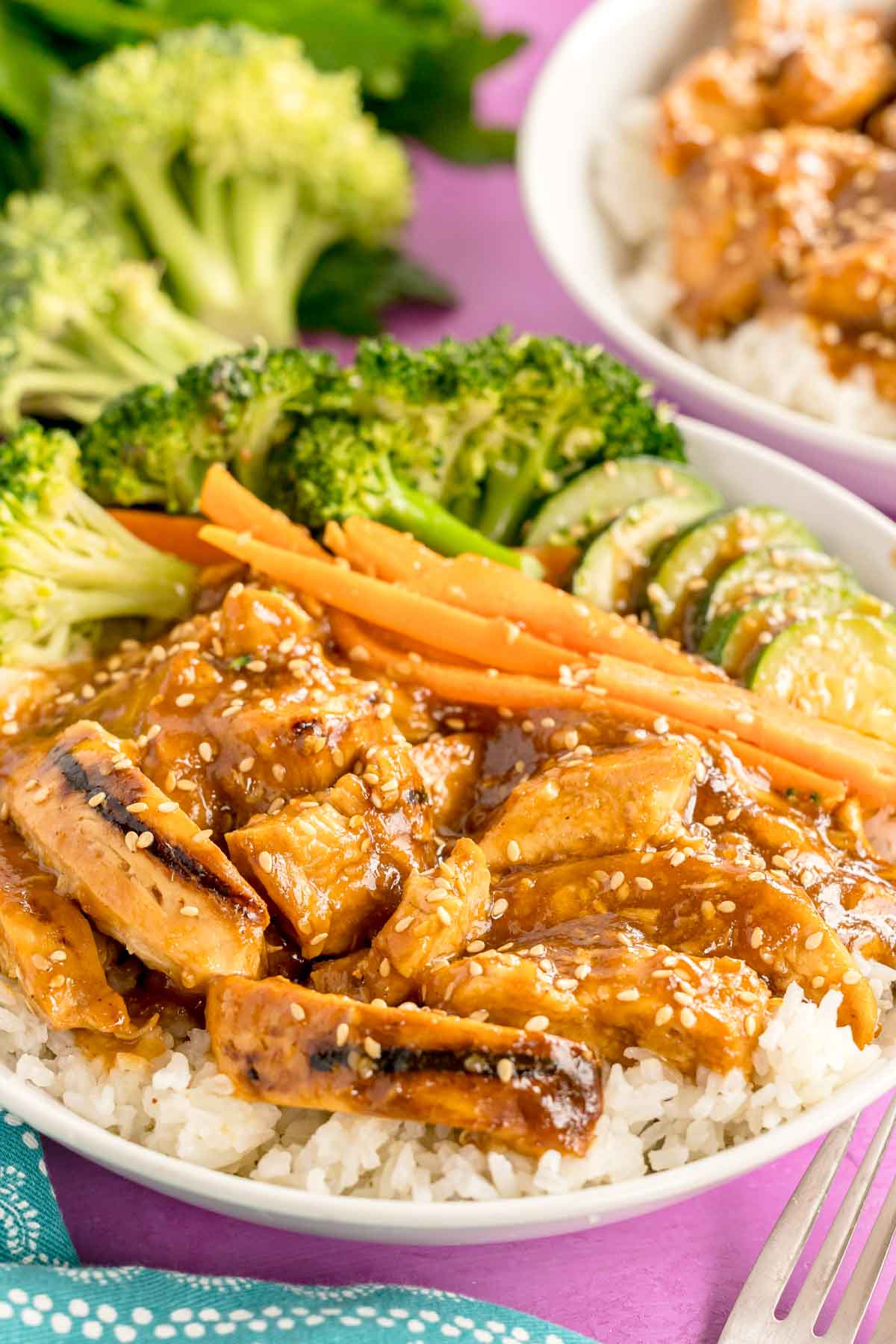 plate with teriyaki chicken, rice, and veggies 