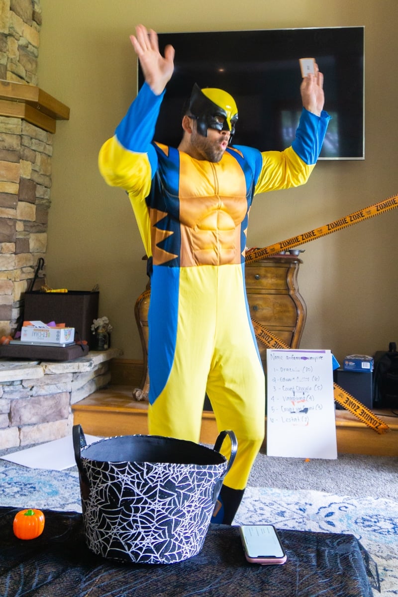 Wolverine acting out Halloween charades